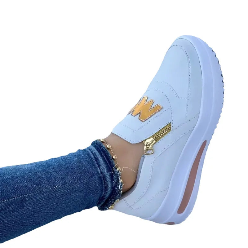 Zapatillas deportivas casuales de plataforma para mujer.